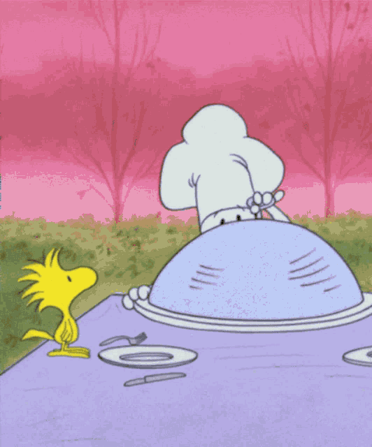 Snoopy in a chef's hat, presenting a covered dish to Woodstock.