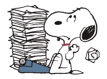 Snoopy at his typewriter, deep in thought over a very tall stack of pages.